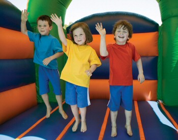 Kids jumping on a Jumping Castle