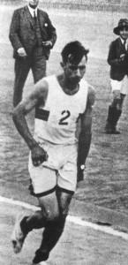 1930.6 Wally winning his first Comrades in 1930(The black mark on the toes of his white takkies was caused by bleeding).
